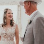bride smiles at her father