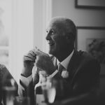 father of the bride laughing at wedding speech