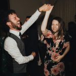 wedding guests enjoying dancing together