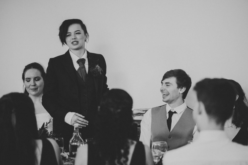 bride and her best man laughing