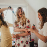 the bride getting ready with her friends
