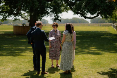 People talking outdoors on a sunny day