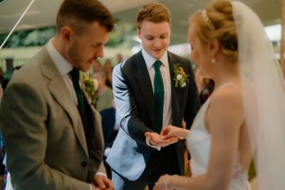 Wedding ceremony with exchanging rings moment.