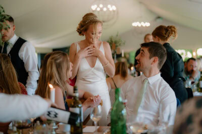 Guests enjoying wedding celebration at table
