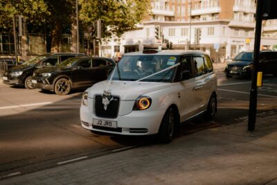 White wedding taxi on London street