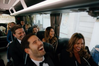 Group laughing on a coach trip