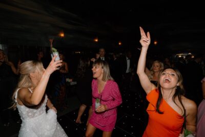 People dancing and celebrating at a party.