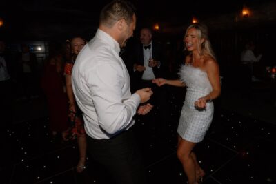 People dancing joyfully at a party.