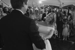 Couple smiling during a wedding dance.