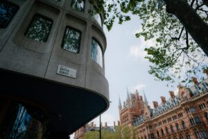 Argyle Street sign, London building, blue sky.
