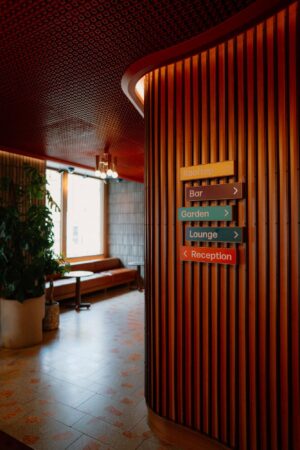 Interior with directional signs and seating area