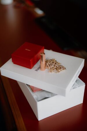 Jewellery box with gold chain on table