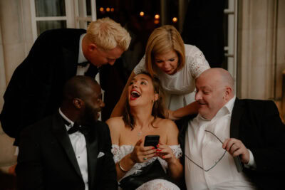 Group laughing and enjoying a joyful moment together.