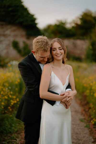 Couple embracing in a garden